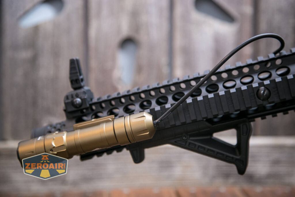 Thrunite TW20 flashlight mounted on rails