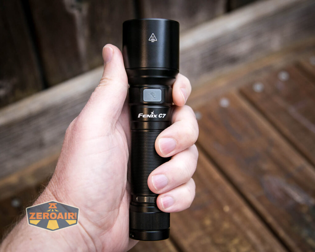 Fenix C7 flashlight in hand