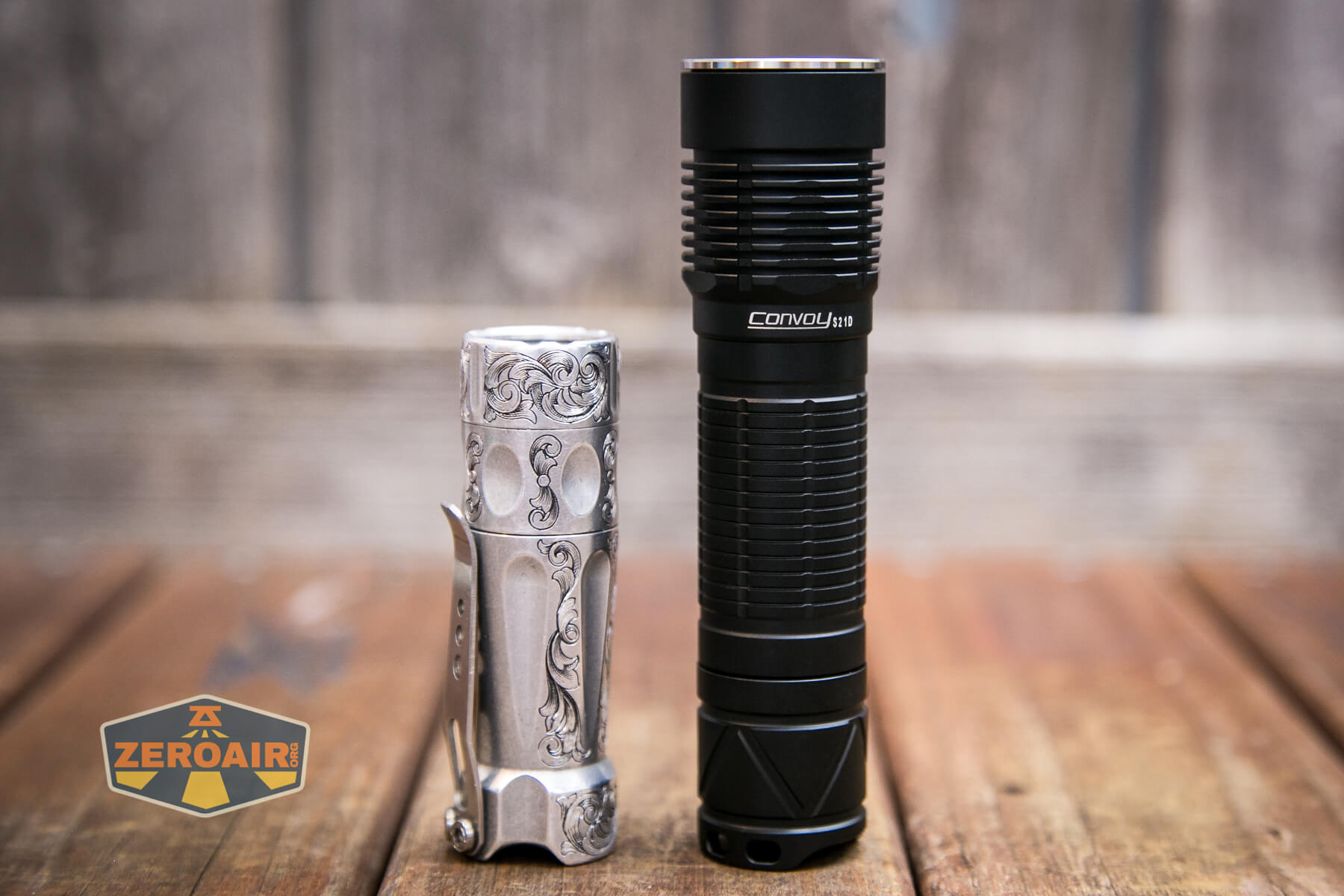 Convoy S21D Nichia 519a Flashlight beside the TorchLAB BOSS 35 (custom-engraved)