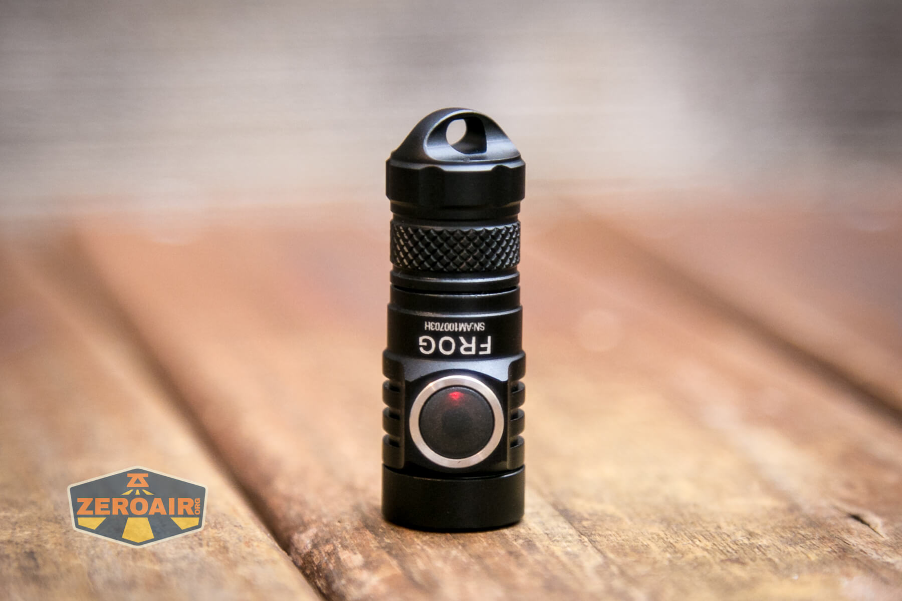 Lumintop Frog Keychain flashlight e-switch indicating red