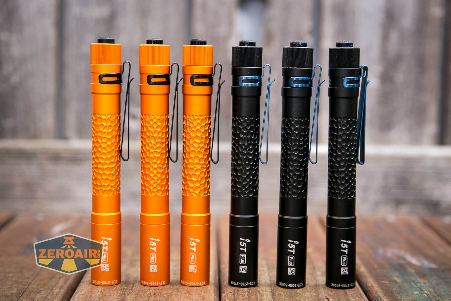 Olight i5T Plus Pebble flashlight all three cct in black and orange