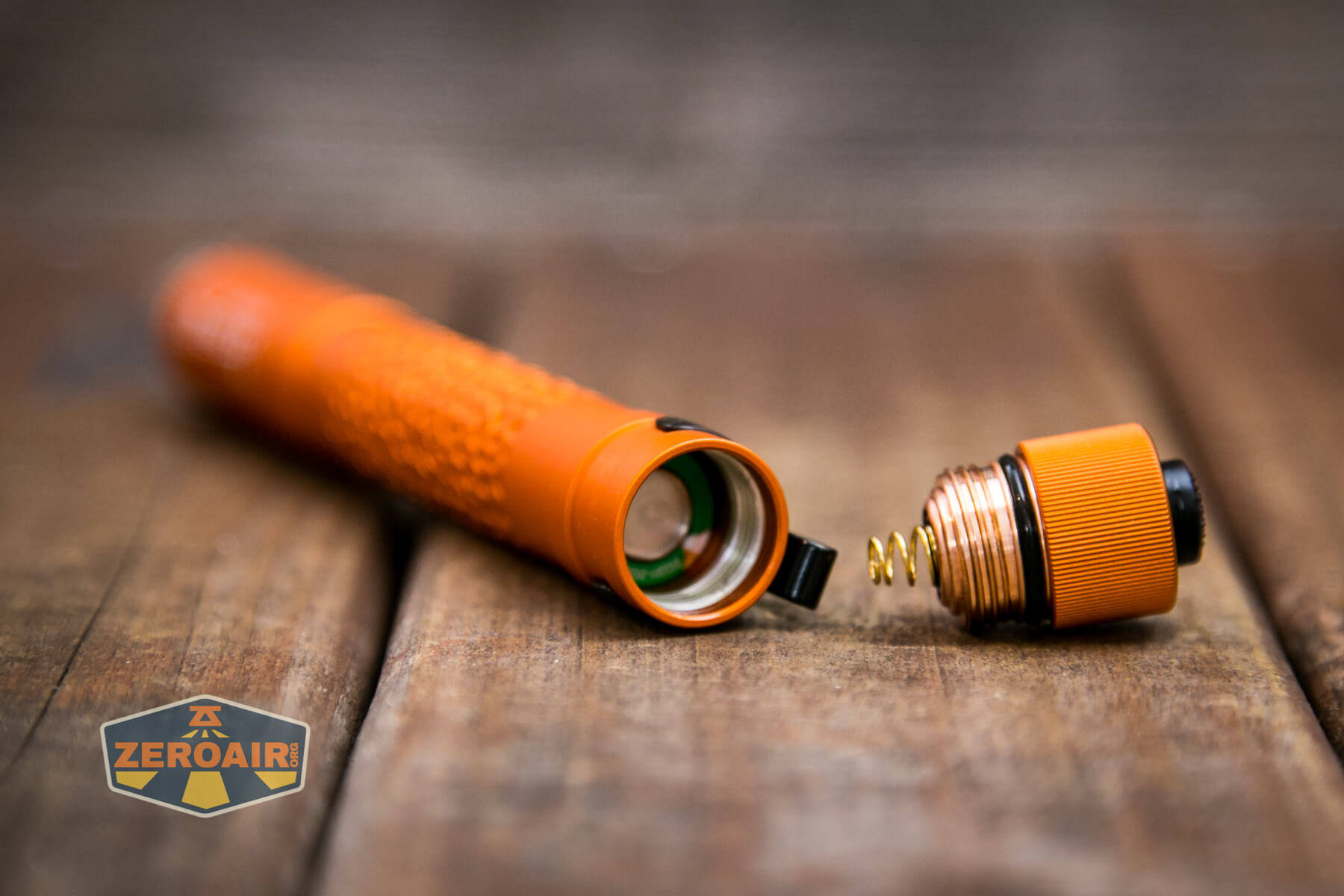 Olight i5T Plus Pebble flashlight AA cells installed