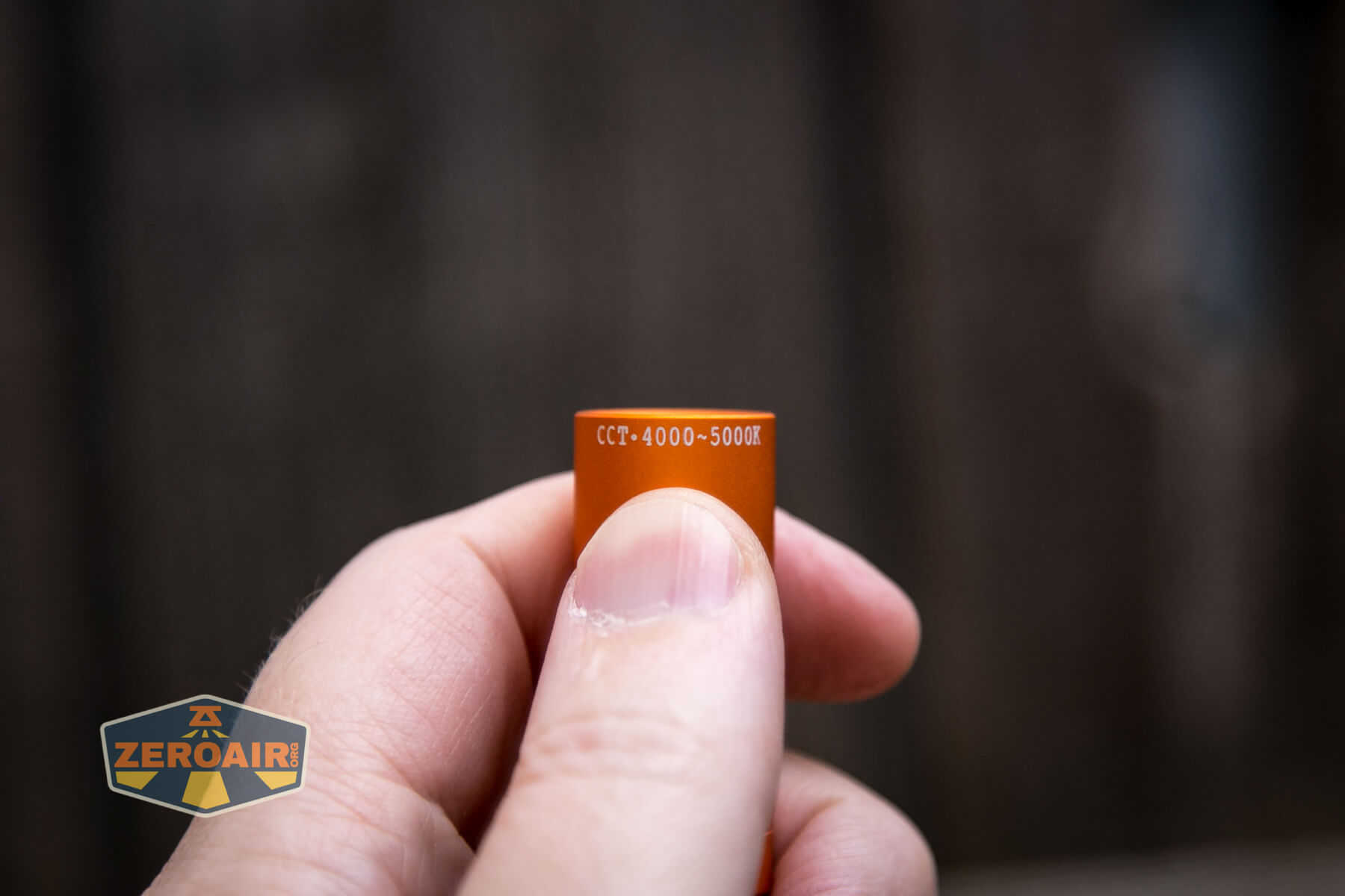 Olight i5T Plus Pebble flashlight CCT on bezel