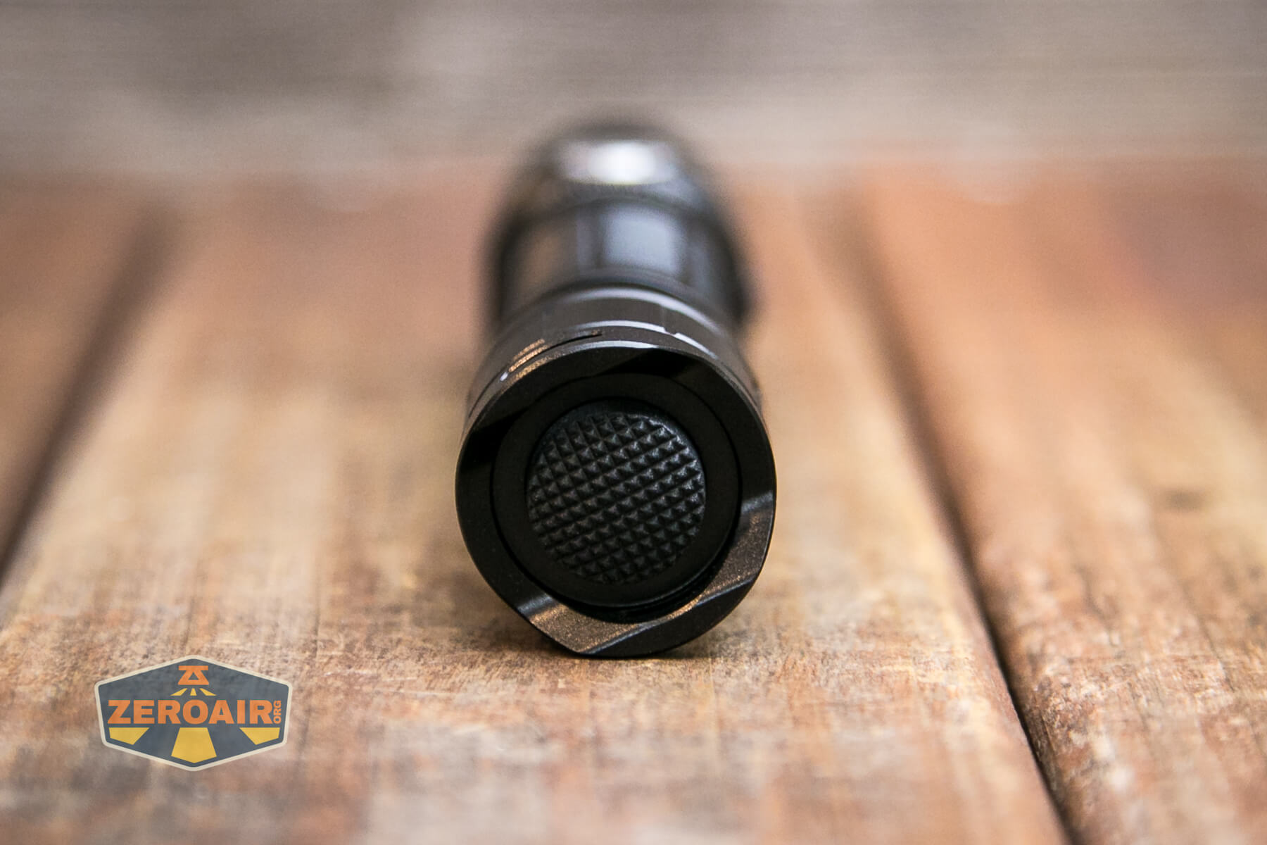 Thrunite TN12 Pro flashlight mechanical tail switch
