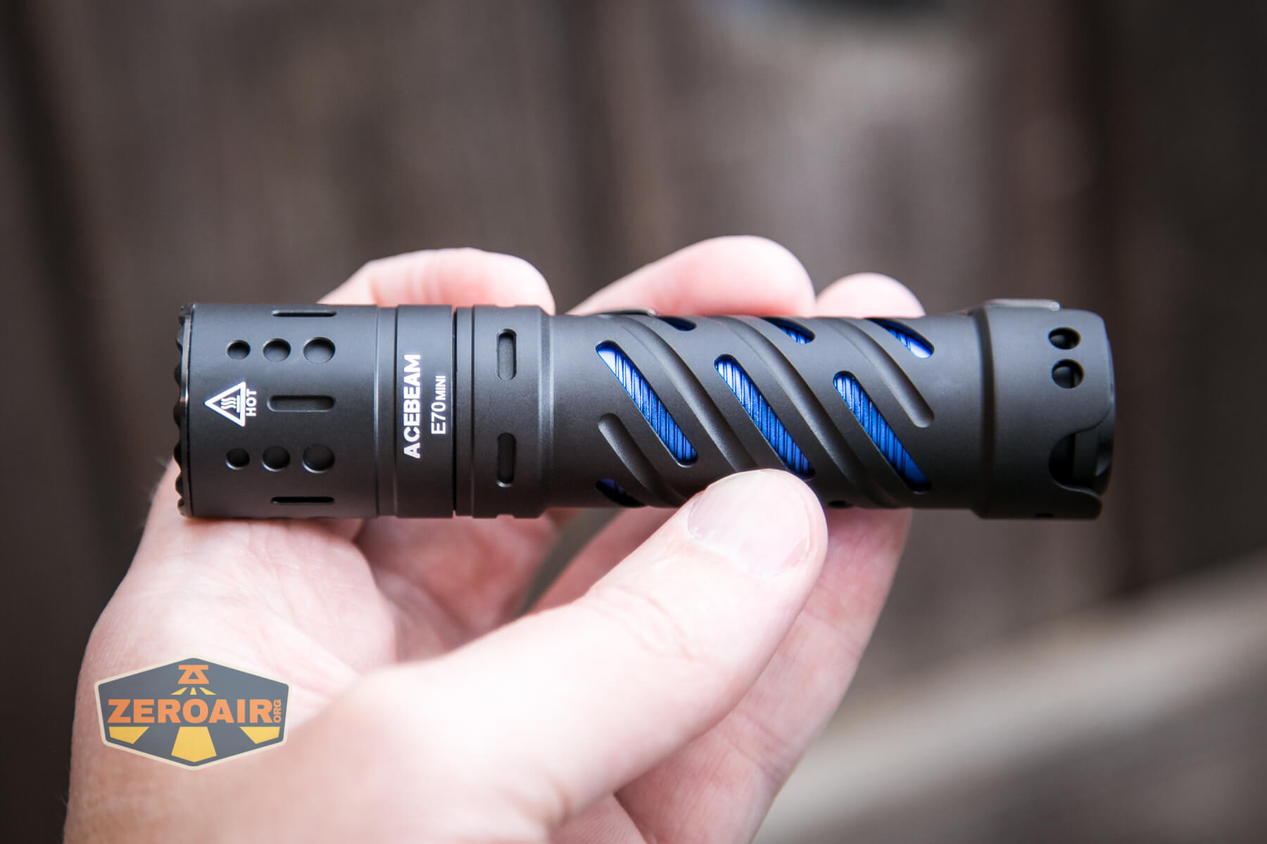 Acebeam E70 Mini flashlight in hand