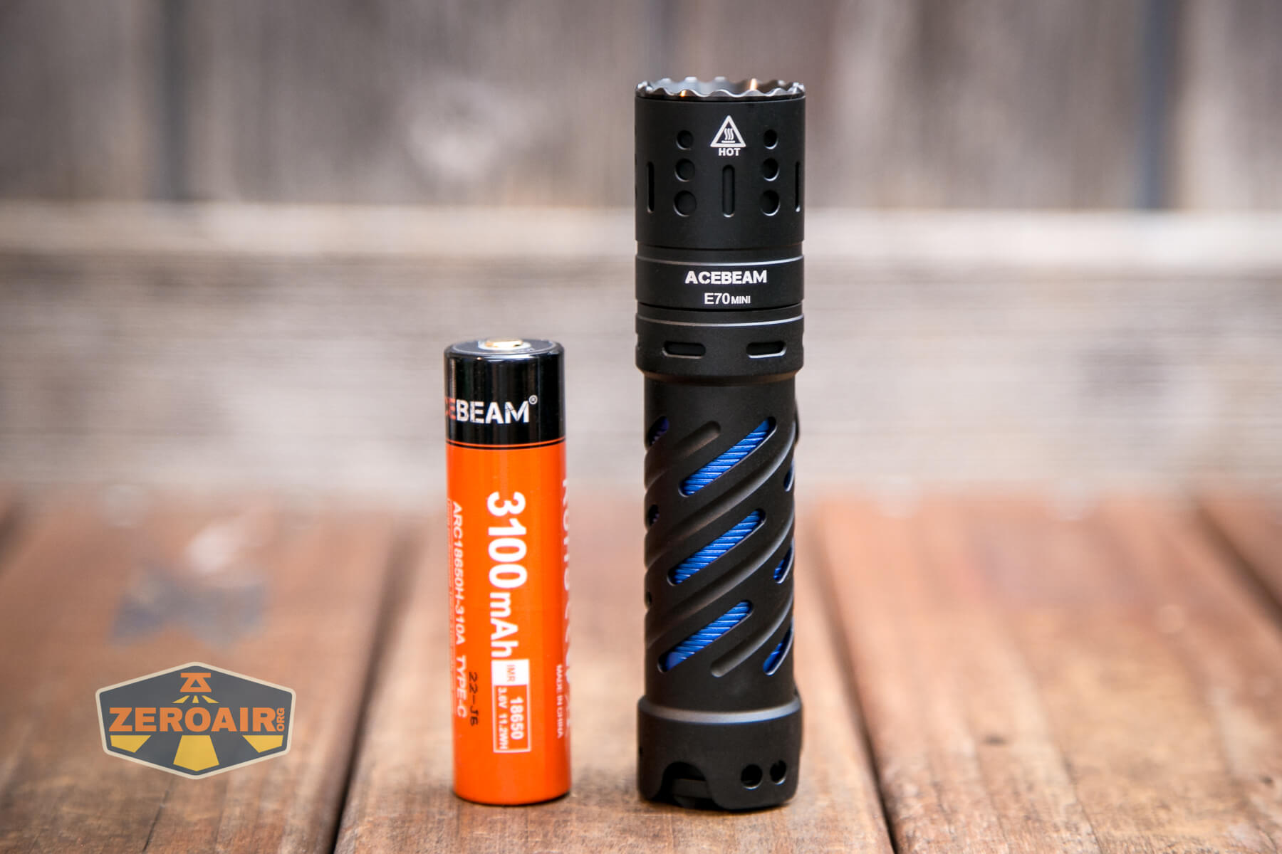 Acebeam E70 Mini flashlight beside 18650