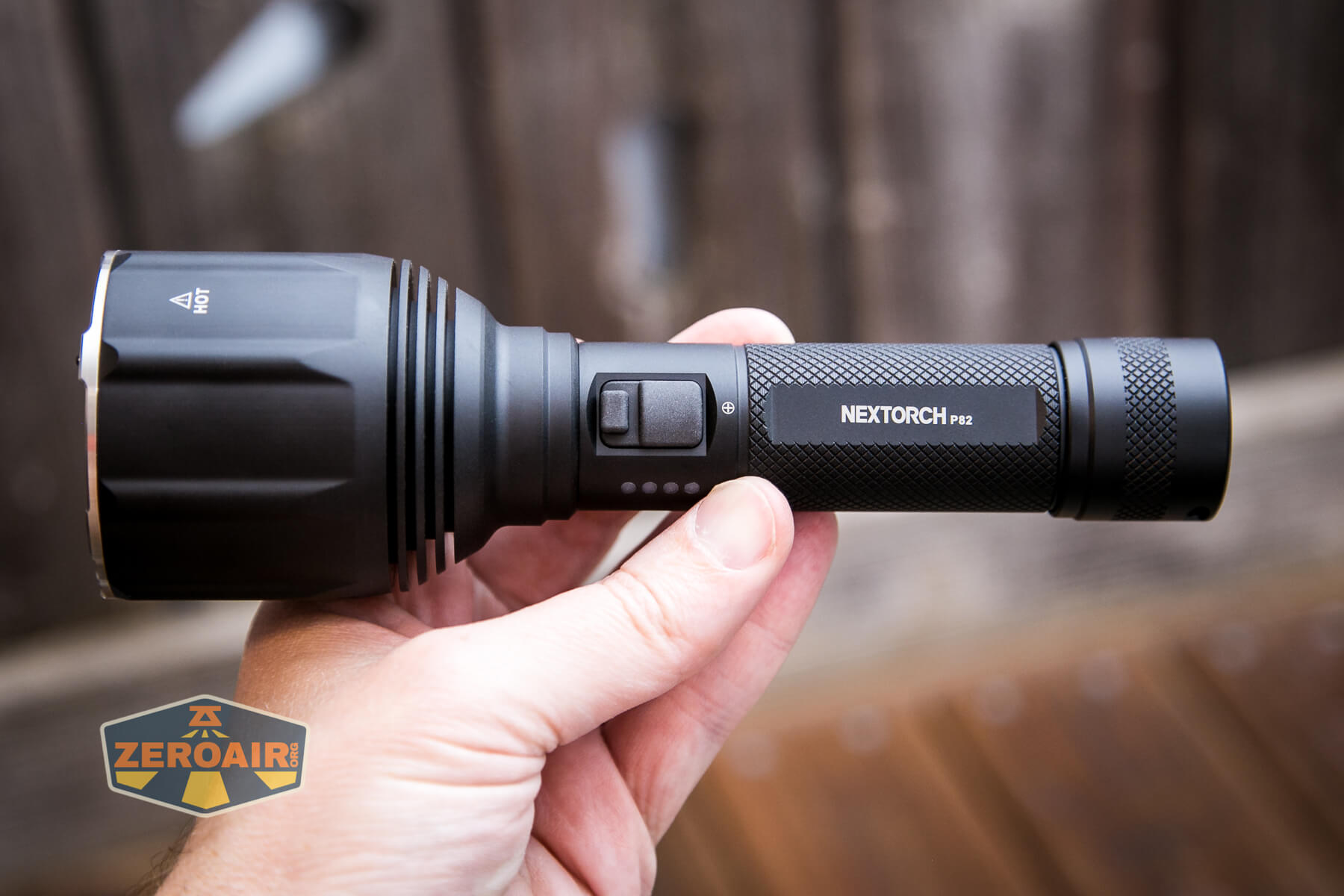 Nextorch P82 long-range flashlight in hand