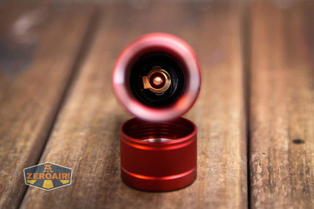 Olight Seeker 3 Pro Flashlight showing head spring