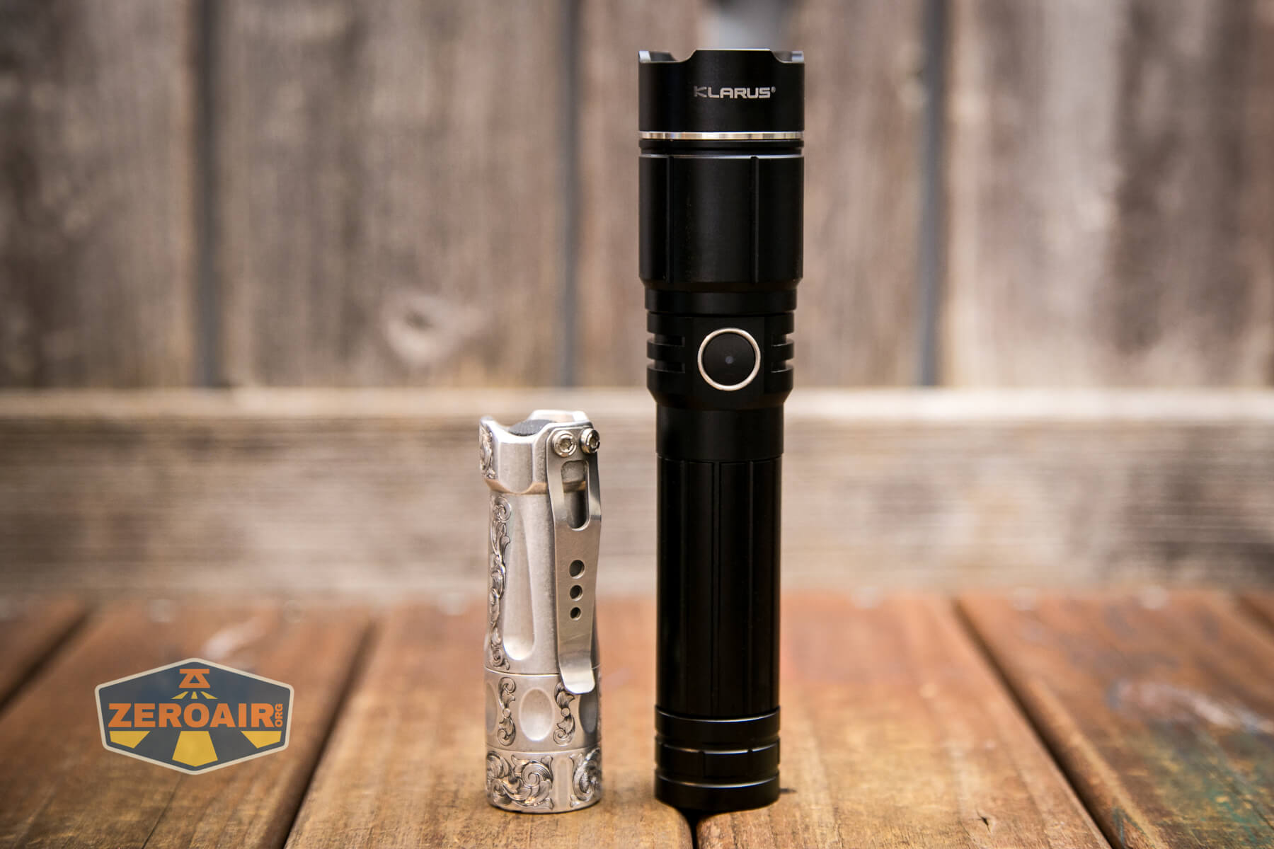 Klarus A2 Pro Zoomable flashlight beside torchlab boss 35