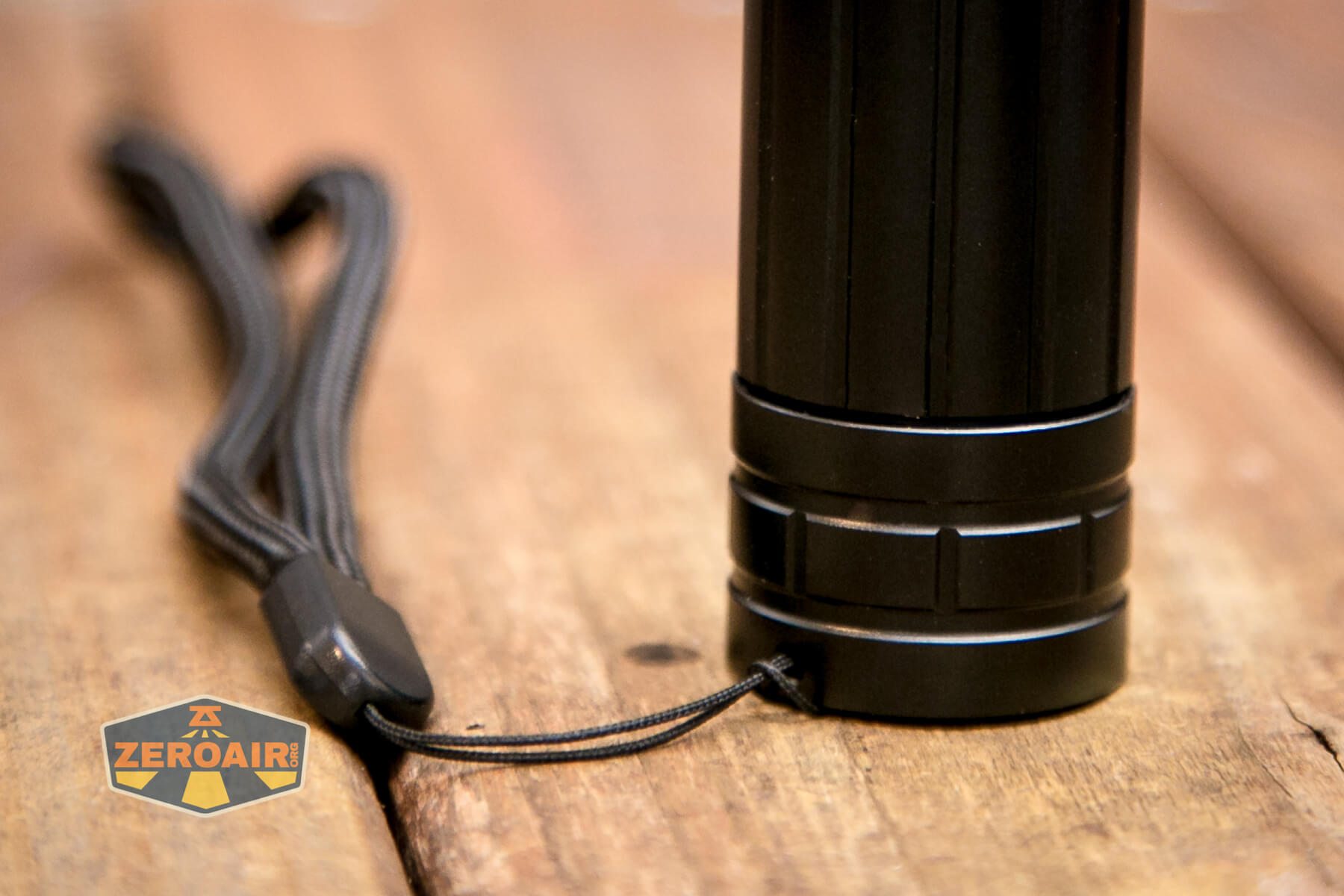 Klarus A2 Pro Zoomable flashlight tailcap lanyard installed