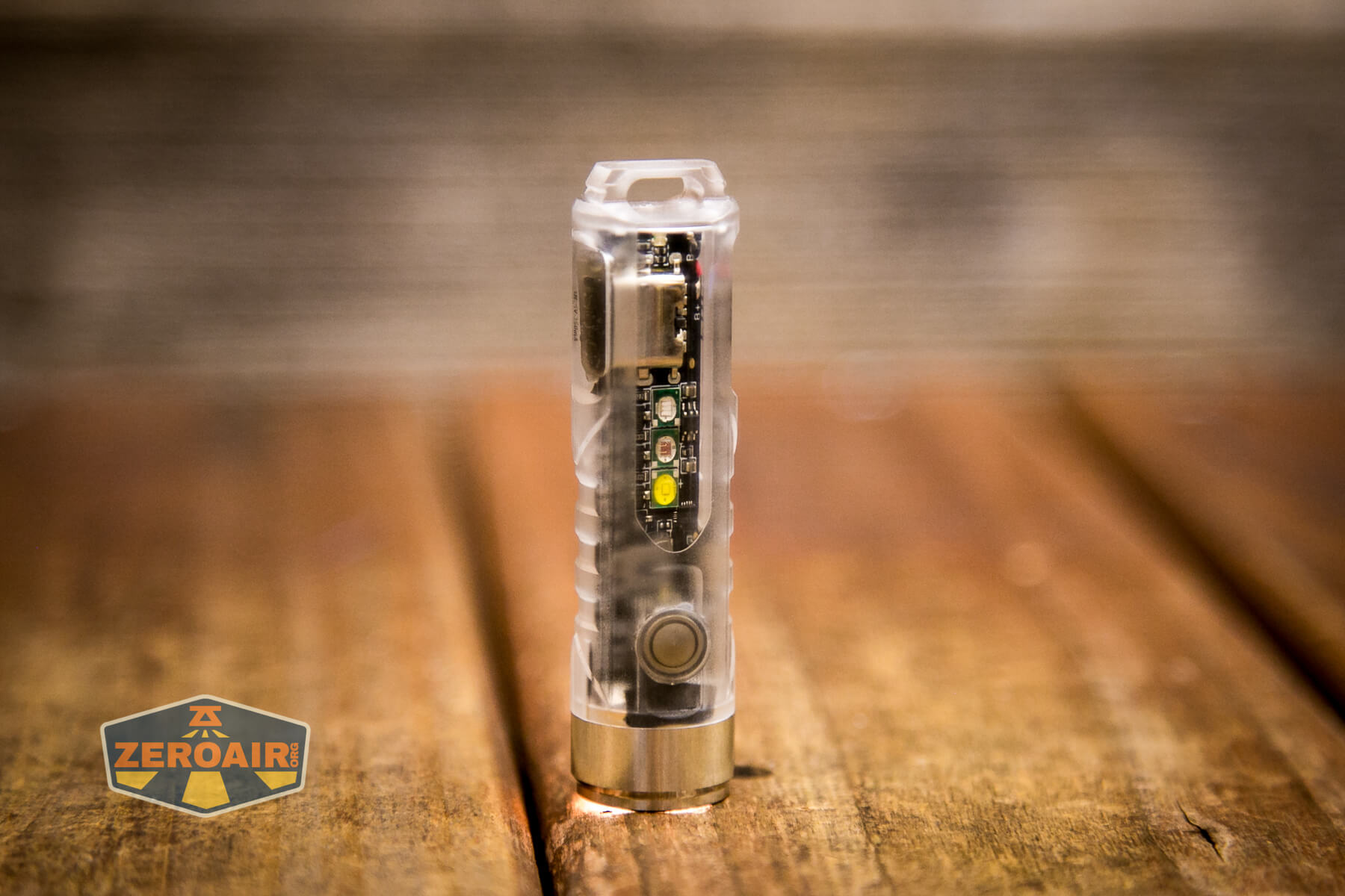 RovyVon Aurora A8 Keychain Flashlight headstanding on