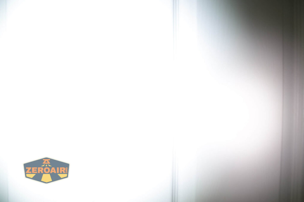 Cyansky P25 V2 flashlight beamshots on door compared to nichia 219b