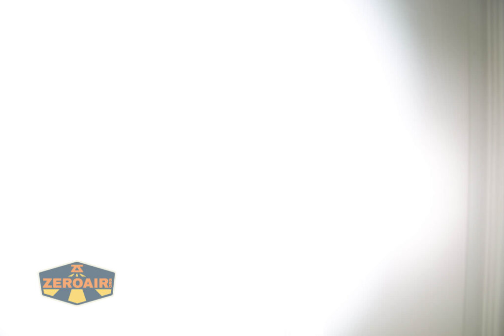 Cyansky P25 V2 flashlight beamshots on door compared to nichia 219b