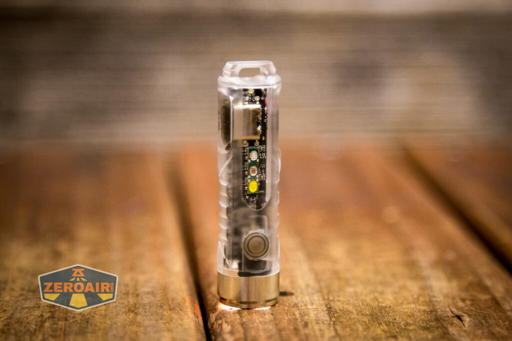 RovyVon Aurora A8 Keychain Flashlight headstanding on