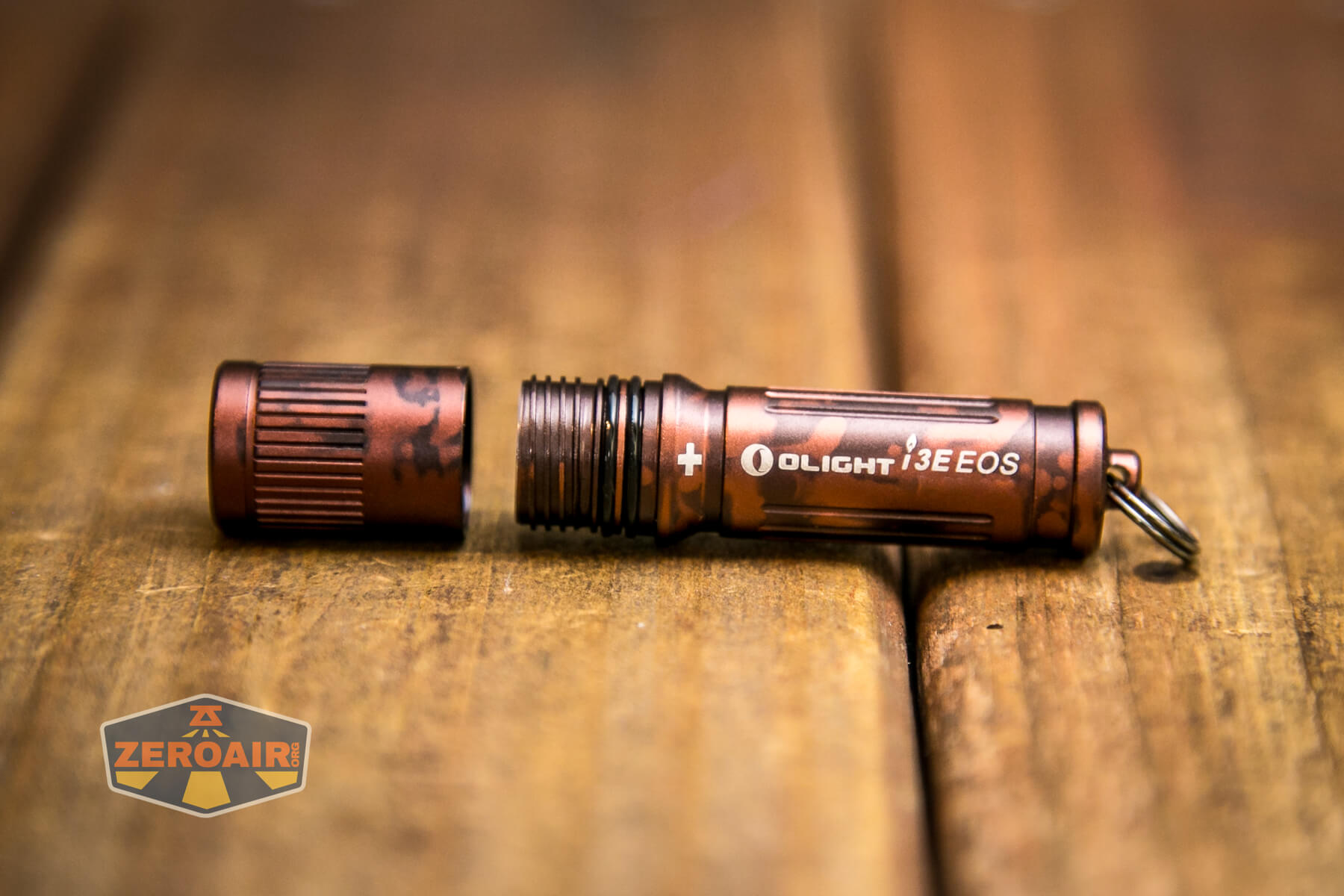 Olight i3E EOS flashlight showing threads