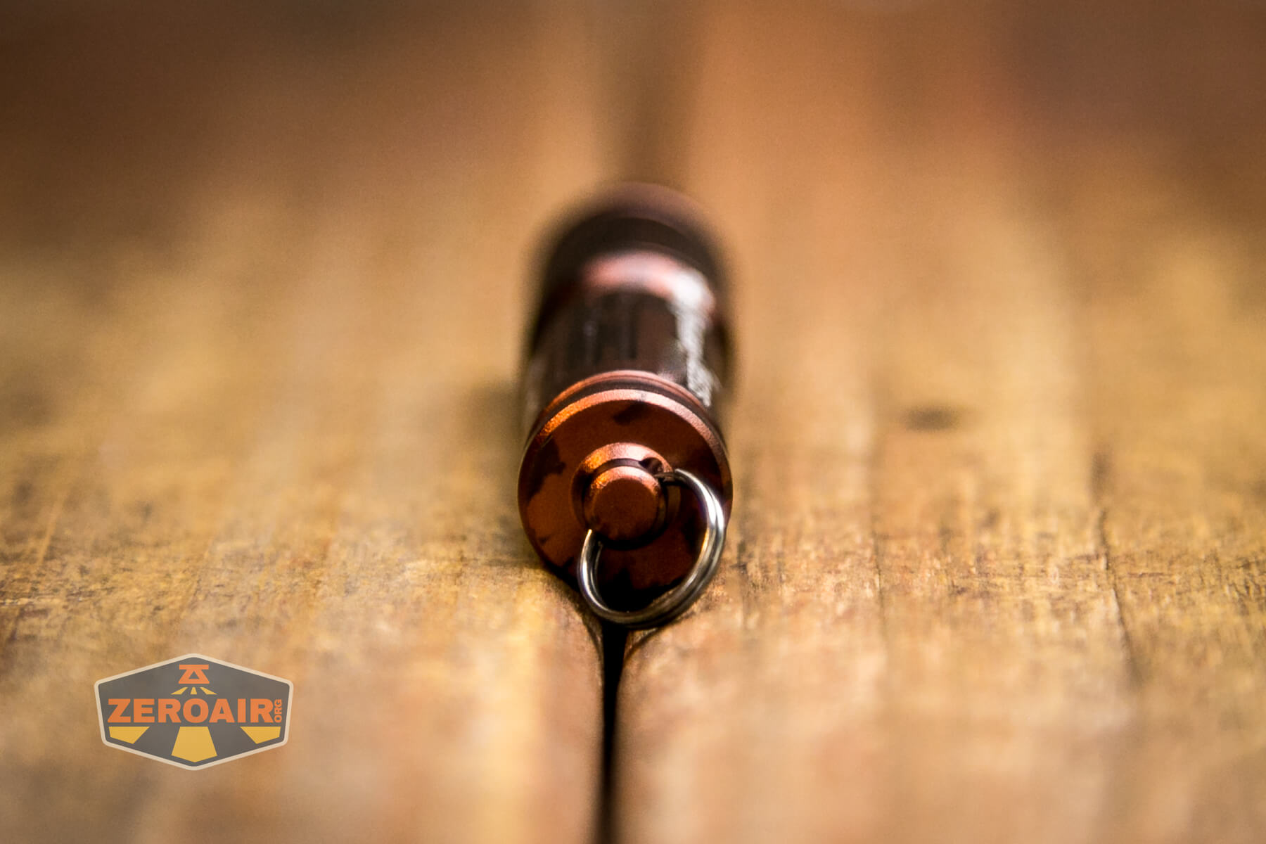 Olight i3E EOS flashlight tailcap