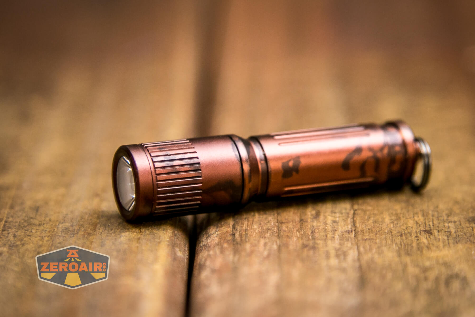 Olight i3E EOS flashlight head grip