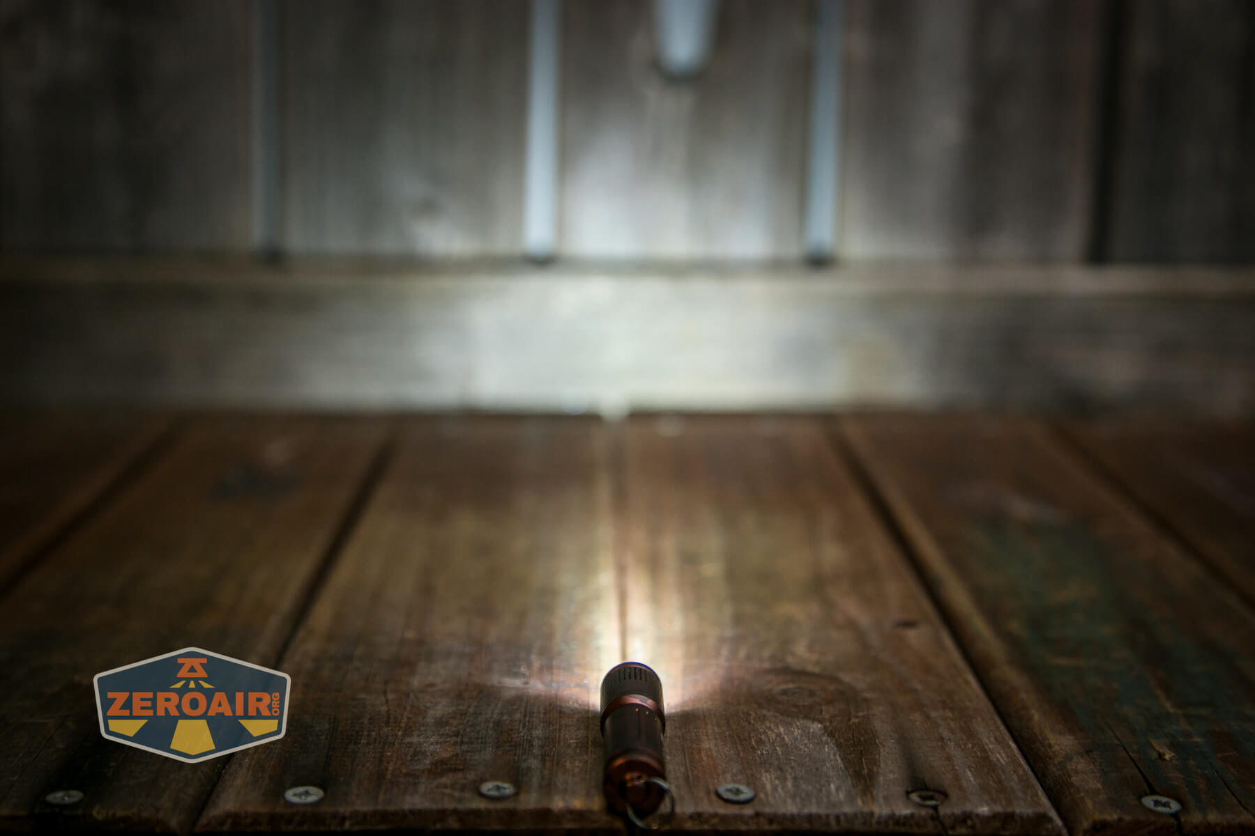 Olight i3E EOS flashlight on