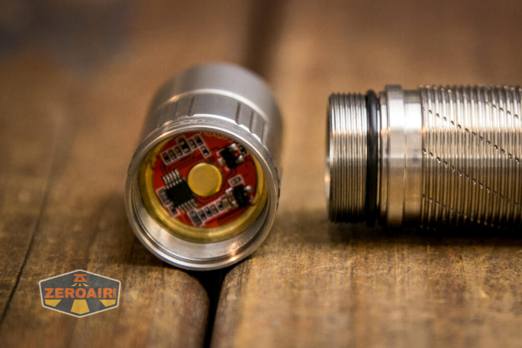 Convoy T3 Titanium flashlight head contact