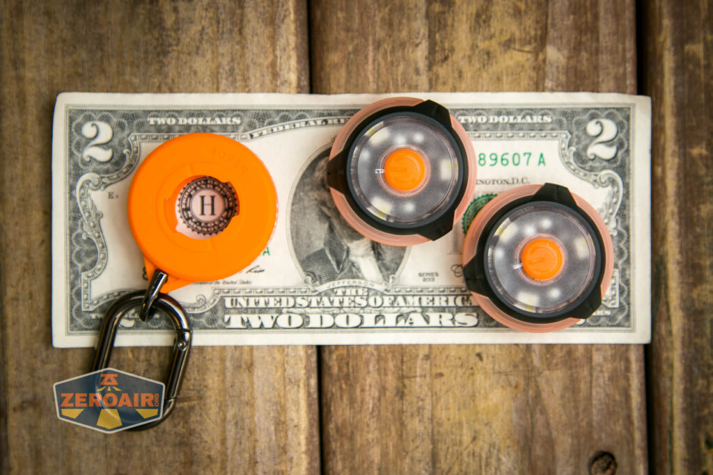 Olight Gober Safety flashlight on two dollar bill