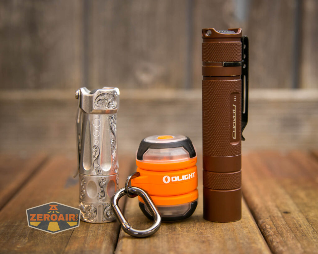 Olight Gober Safety flashlight with comparable lights
