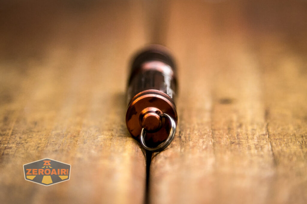 Olight i3E EOS flashlight tailcap