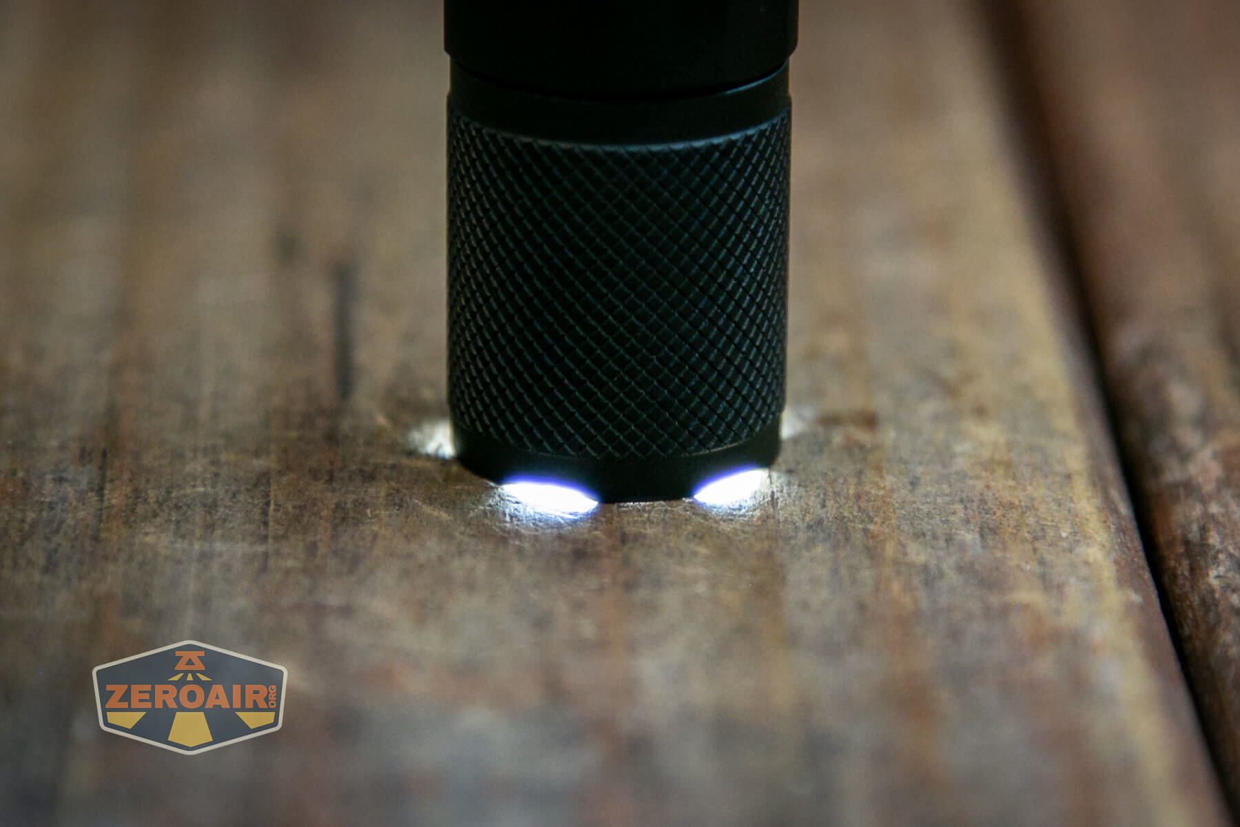 Lumintop EDC 2AA flashlight bezel shape