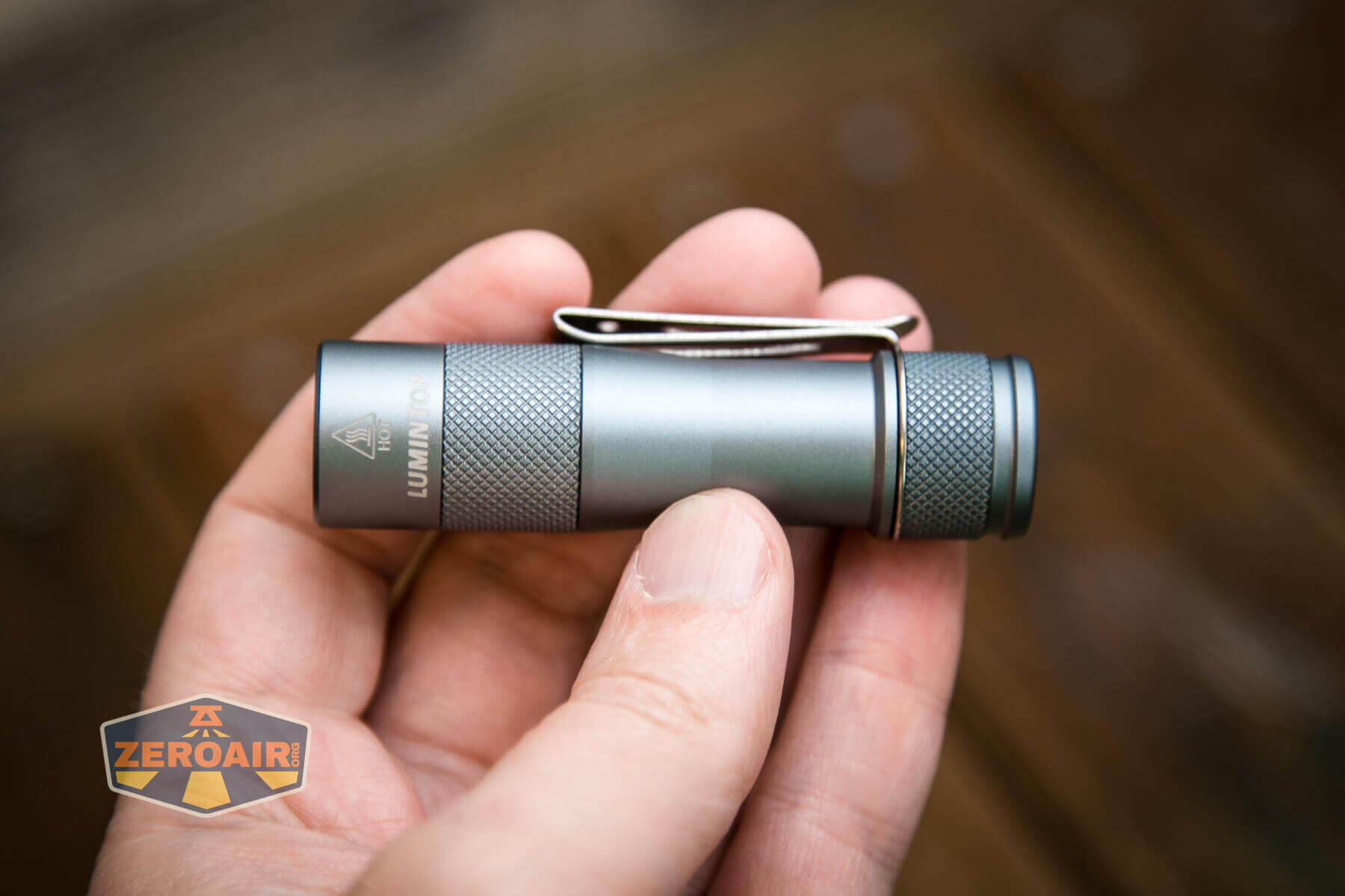 Lumintop FW1AA flashlight in hand