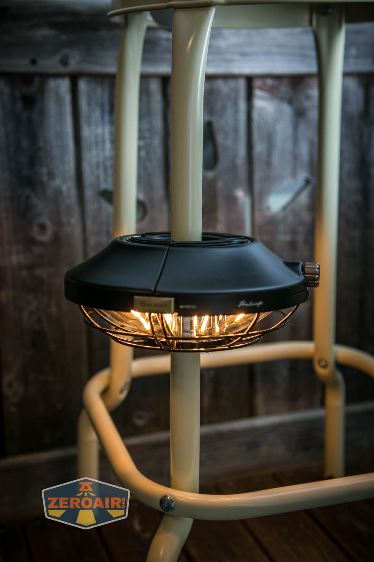 Olight Haloop camping lantern mounted on pipe