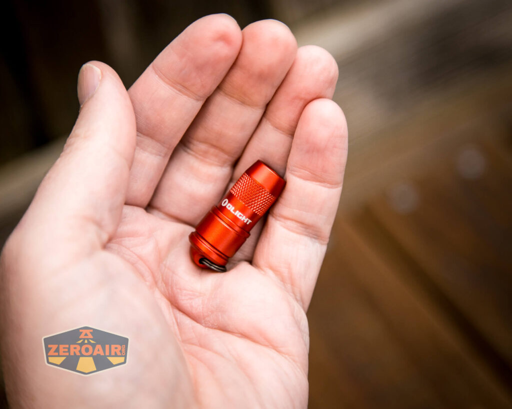 Olight iMini Keychain Flashlight in hand