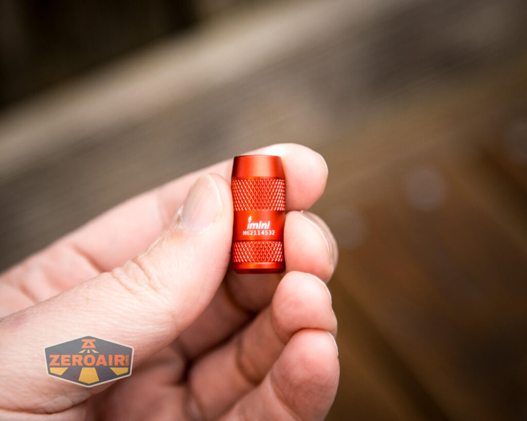 Olight iMini Keychain Flashlight in hand