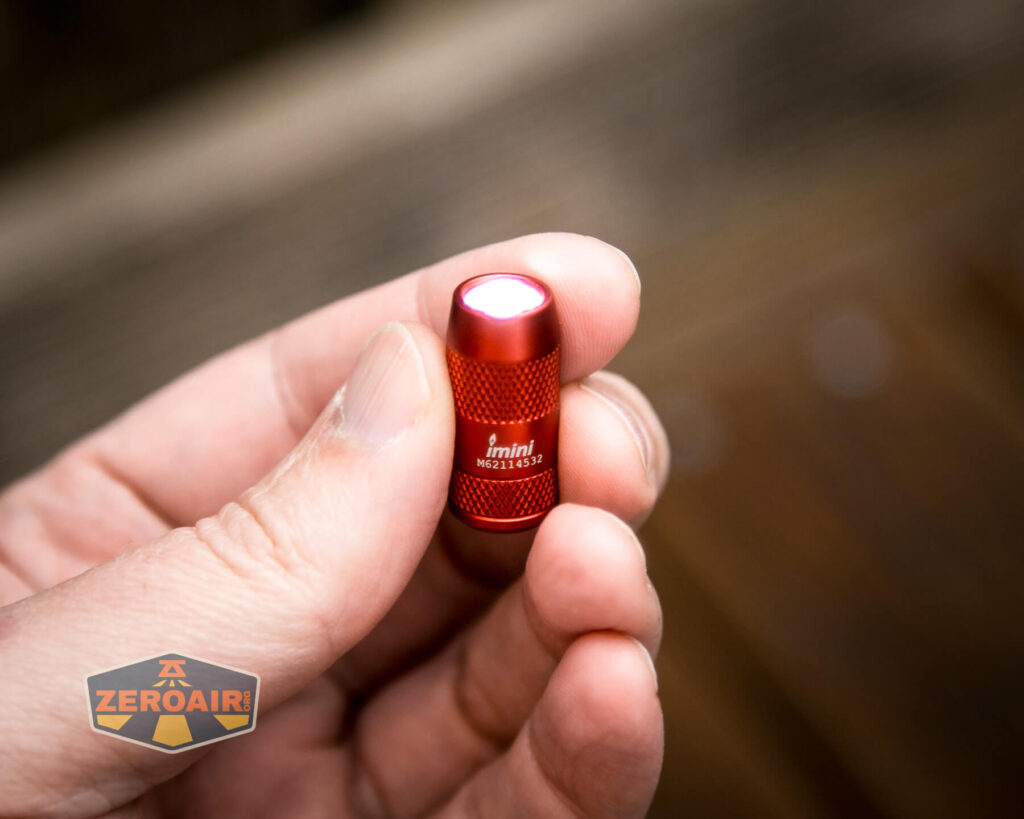 Olight iMini Keychain Flashlight in hand