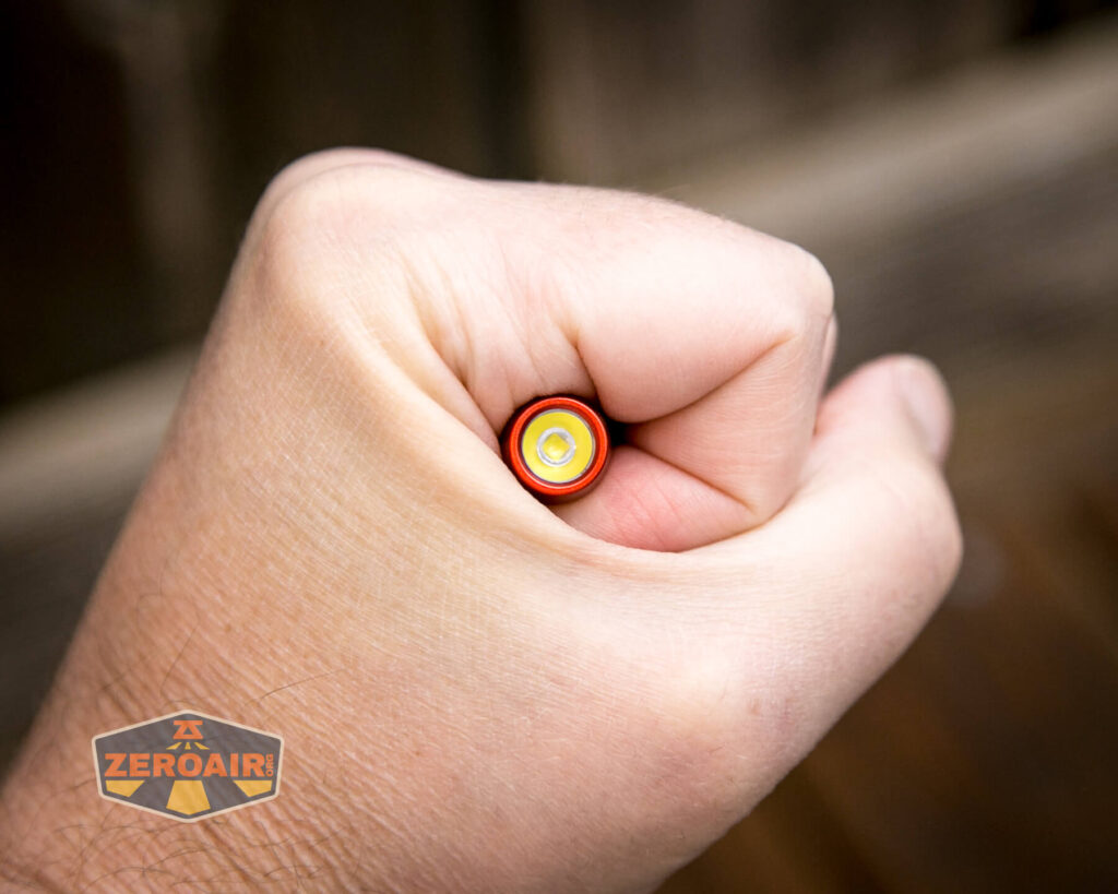 Olight iMini Keychain Flashlight in hand
