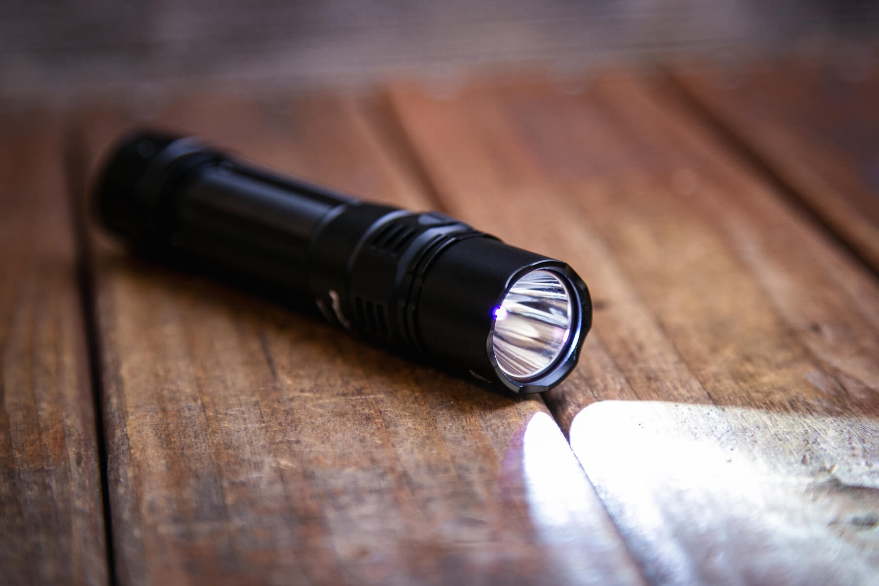 Fenix PD36R Pro rechargeable flashlight emitter on