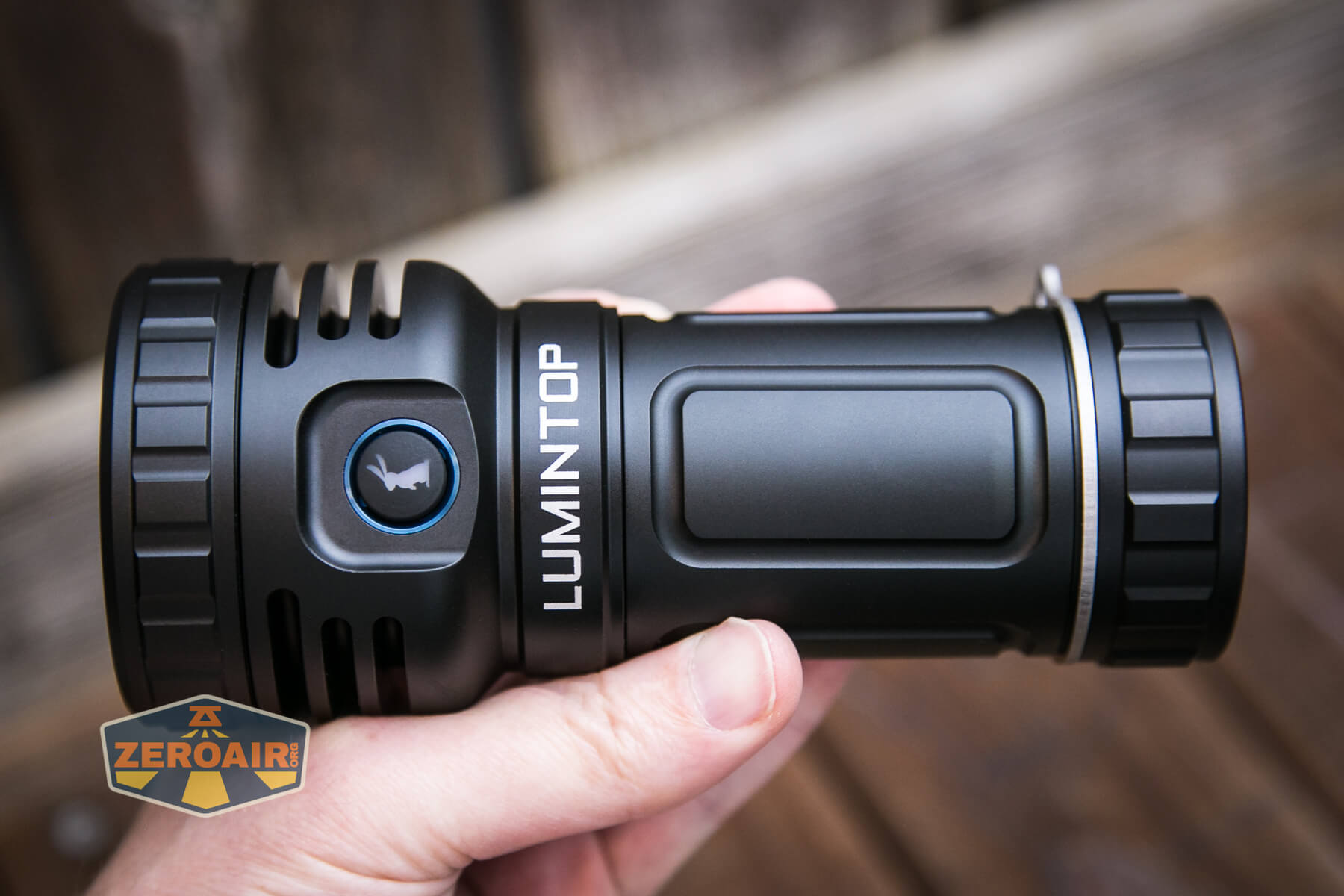 Lumintop Thor Pro LEP and LED flashlight in hand