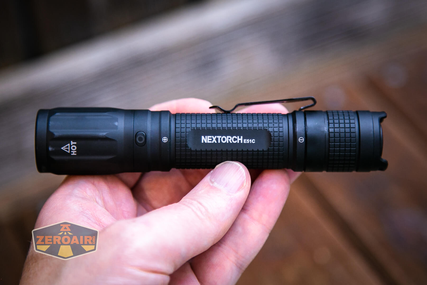 Nextorch E51C rechargeable flashlight in hand
