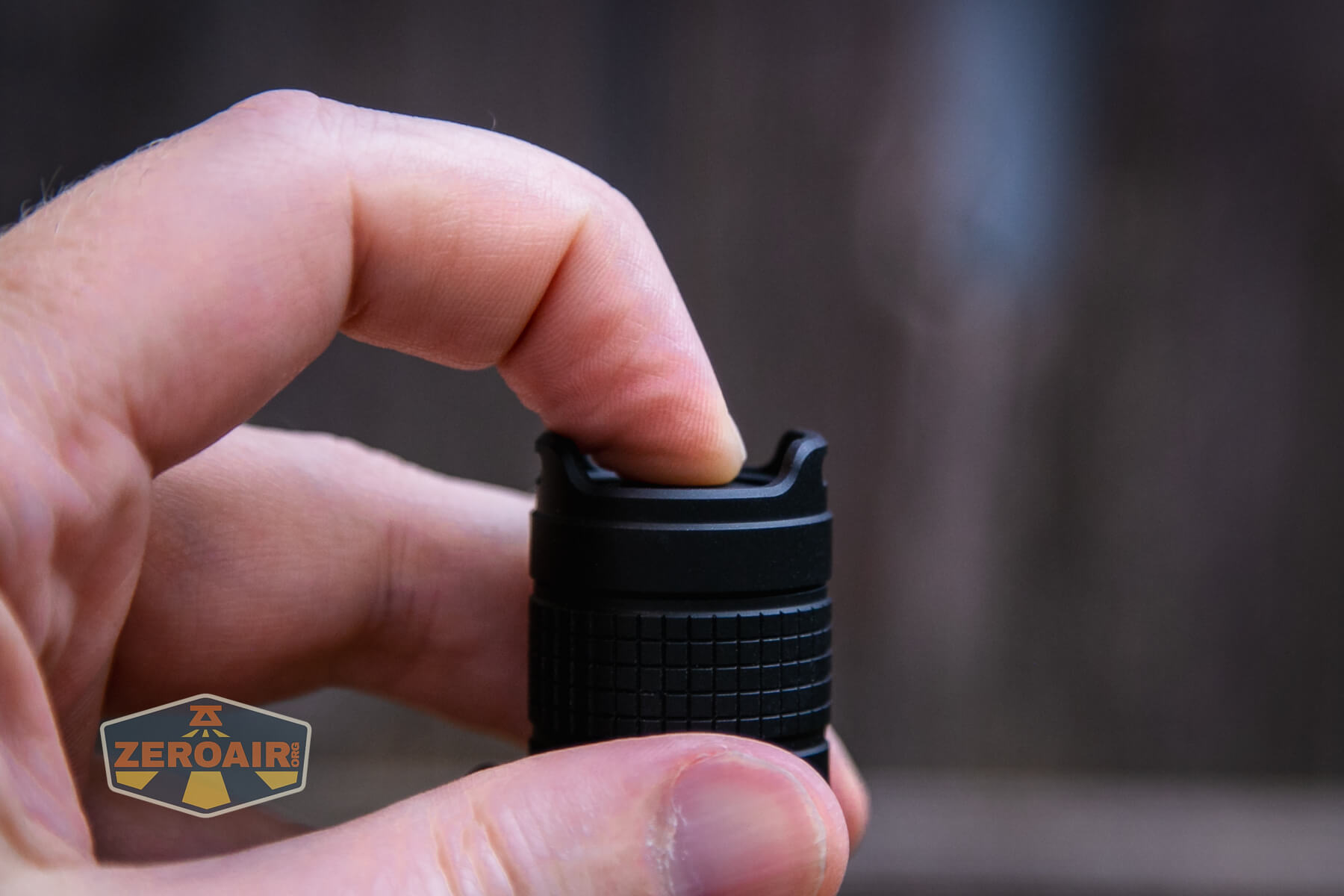 Nextorch E51C rechargeable flashlight tail switch actuation