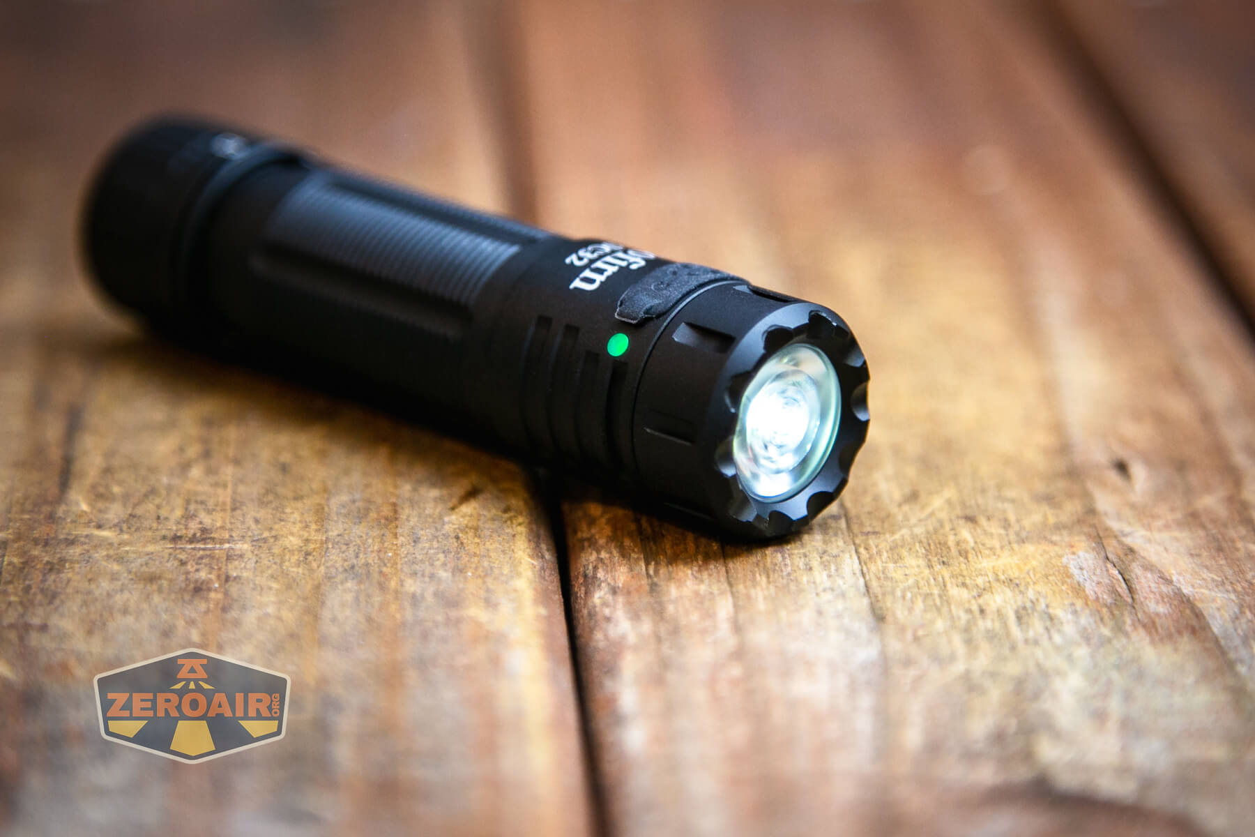 Sofirn SC32 Mini Tactical flashlight emitter on