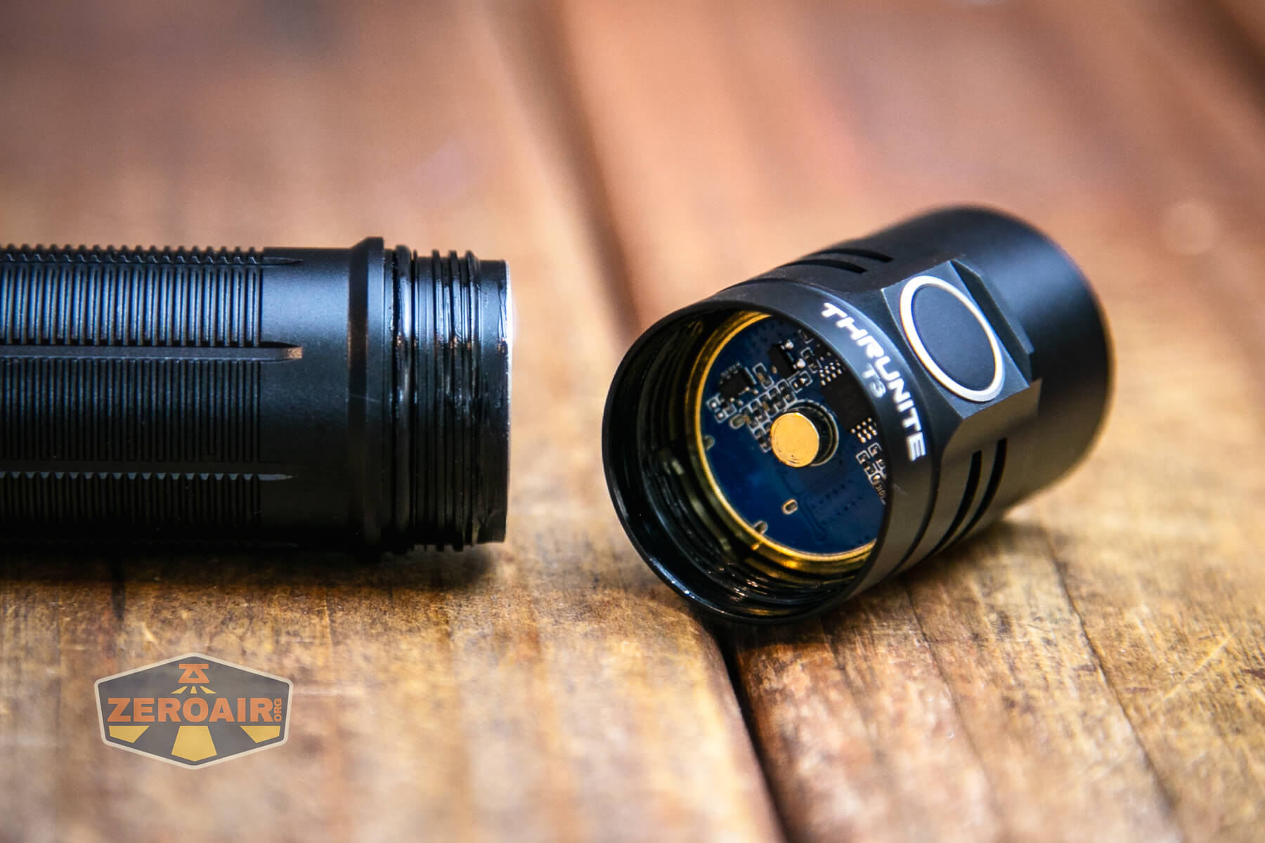 Thrunite T3 thrower flashlight head contact button