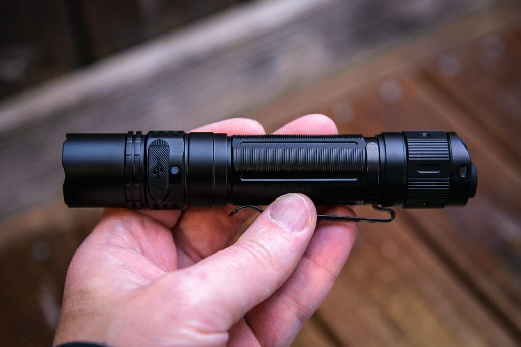 Fenix PD36R Pro rechargeable flashlight in hand