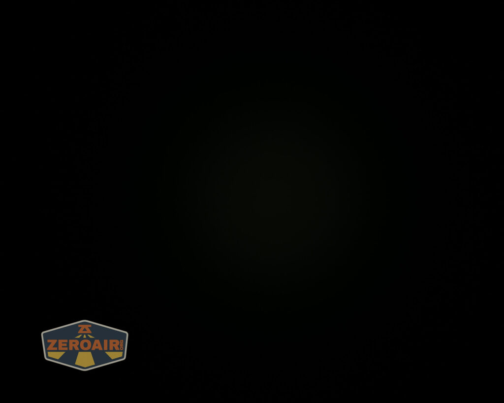 A mostly black image with a faint logo in the bottom left corner that reads ZEROAIR in orange letters on a dark, shield-shaped background.