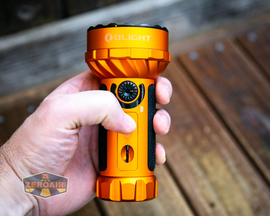 Olight Marauder Mini flashlight in hand