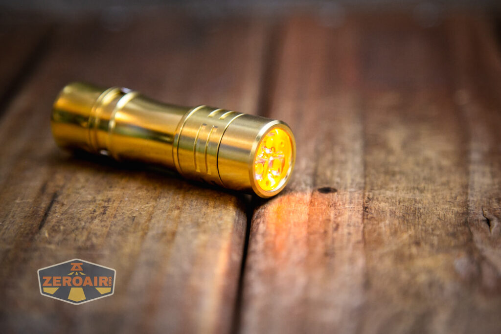 Wurkkos TS10 Brass flashlight TIR with amber on