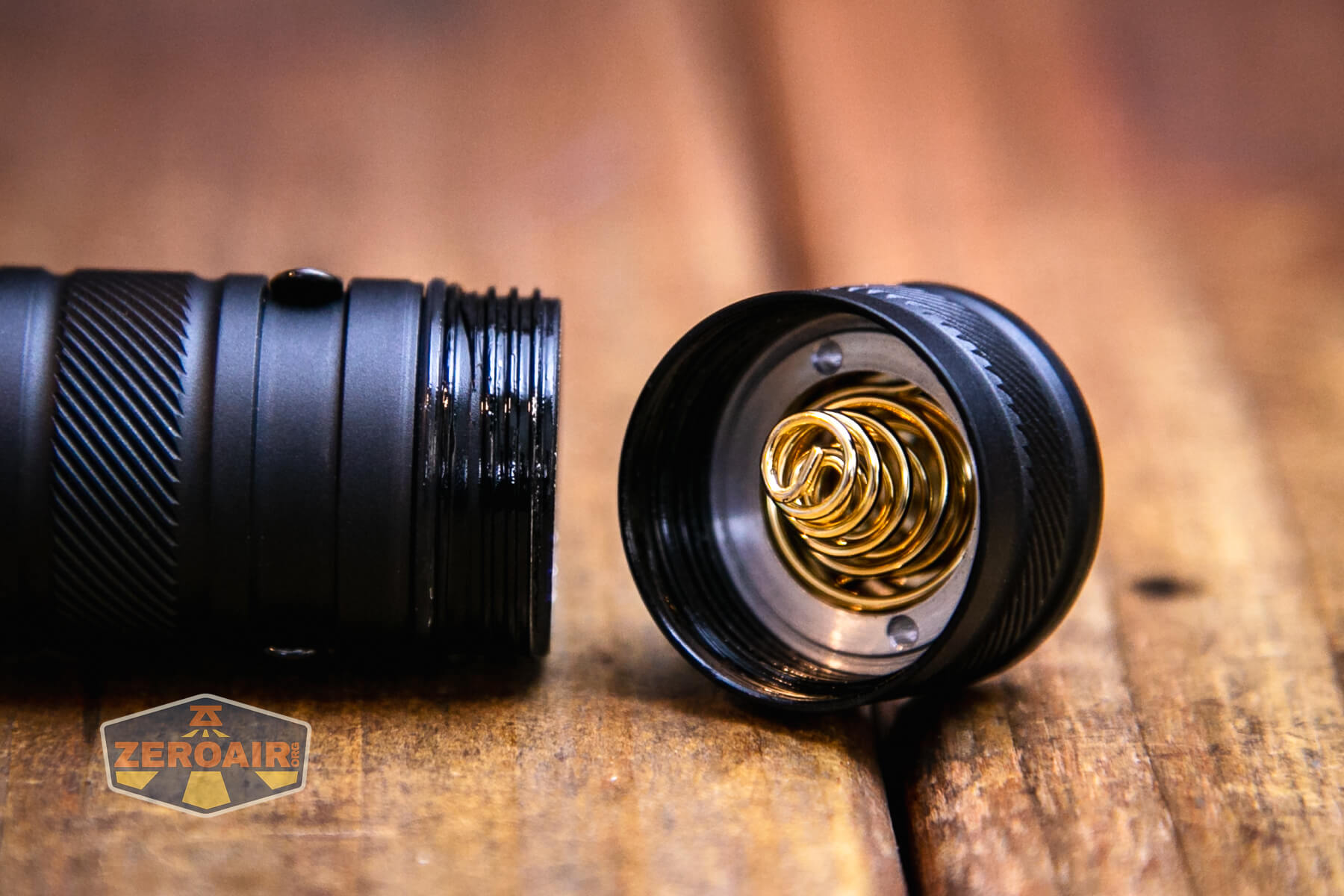 RovyVon Search S23 flashlight tailcap off showing spring and threads