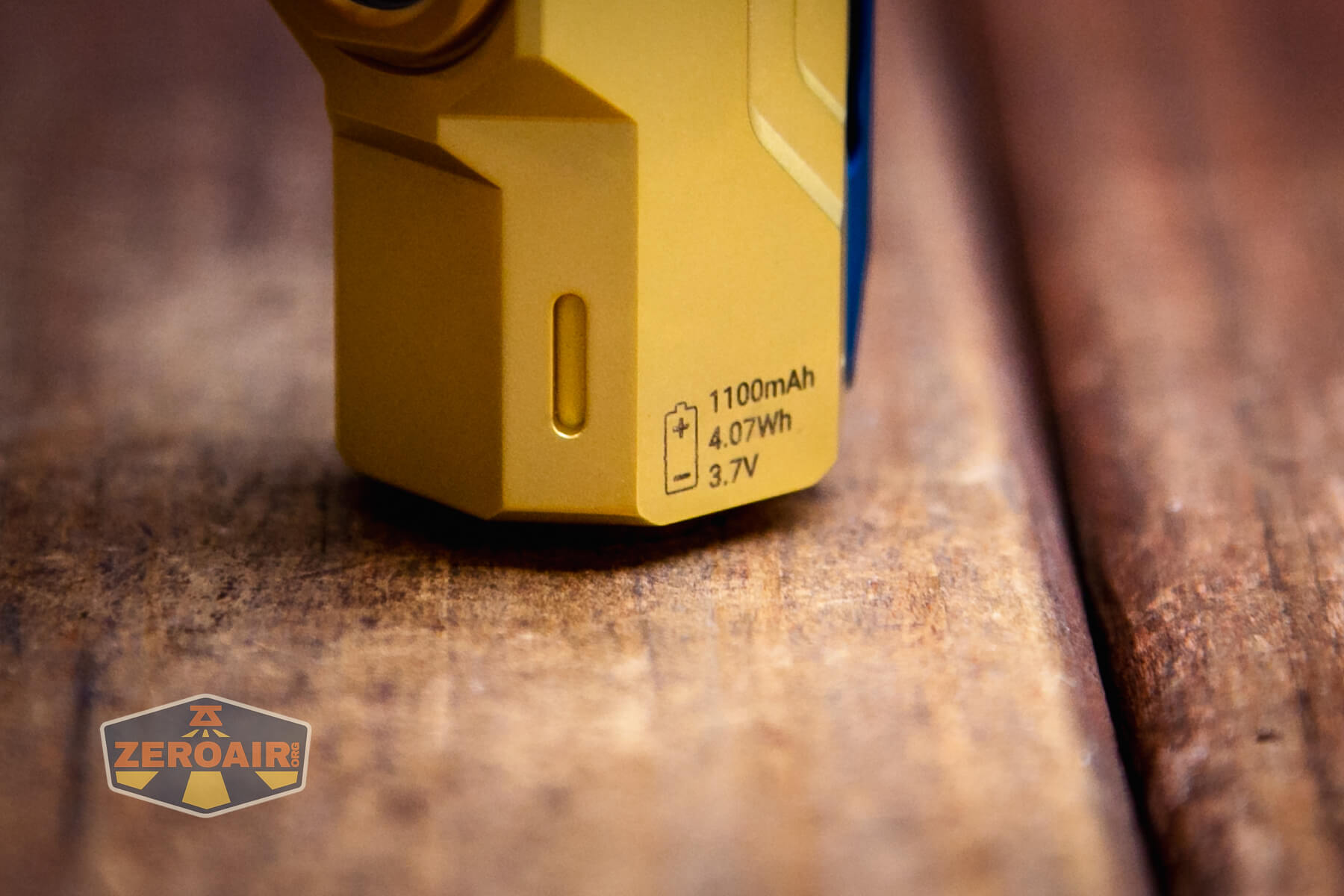 Wuben X-0 Knight brass flashlight printed battery information