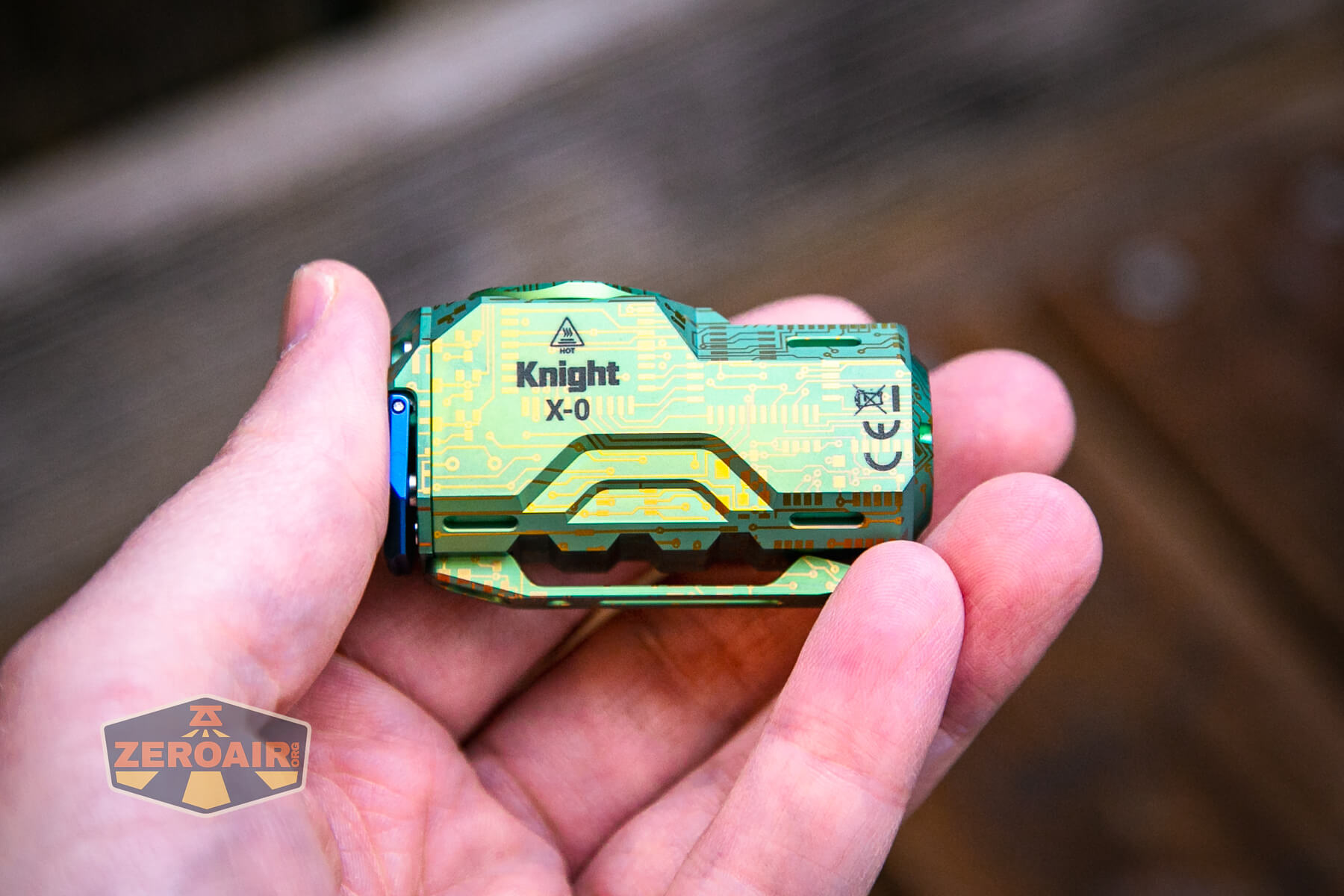 Wuben X-0 Knight titanium flashlight in hand