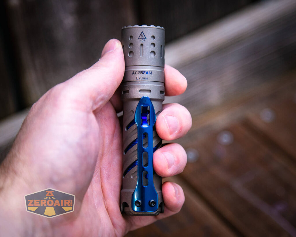 Acebeam E70 Mini Titanium flashlight in hand