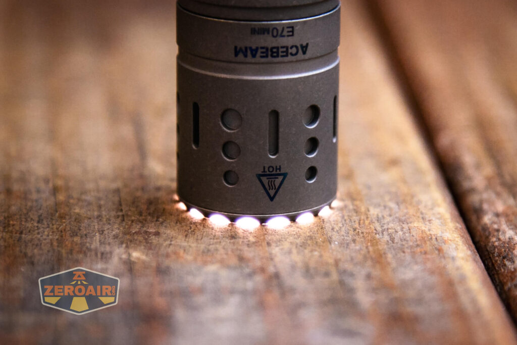 Acebeam E70 Mini Titanium flashlight toothy bezel