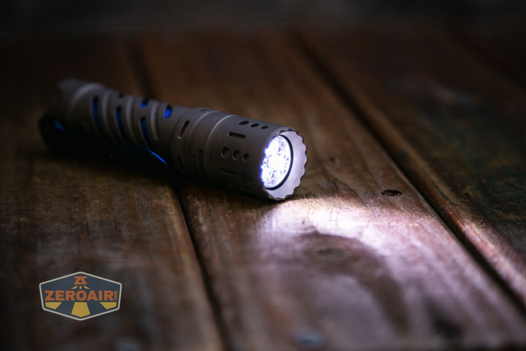 Acebeam E70 Mini Titanium flashlight emitters on