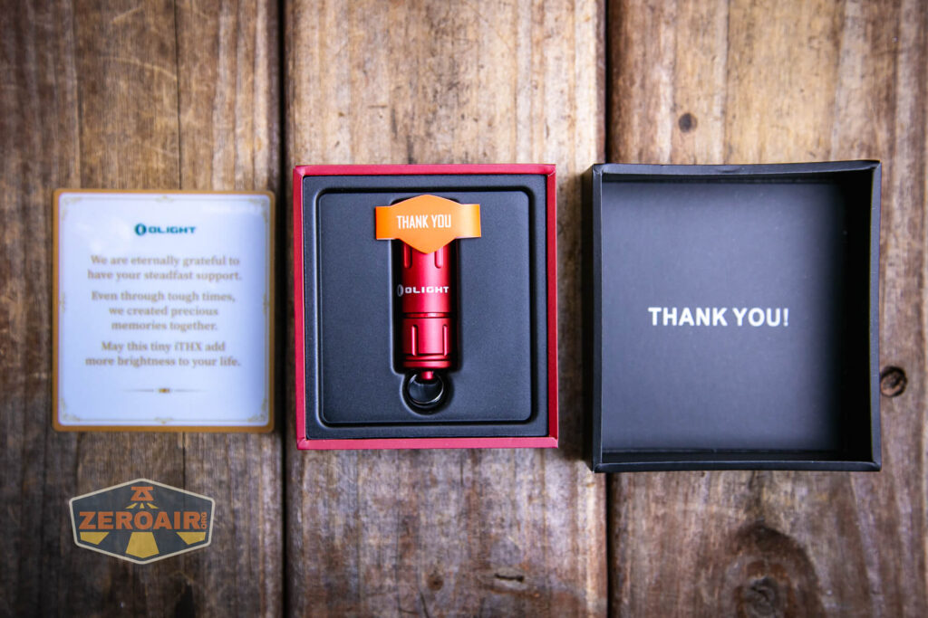 Olight iThx Keychain flashlight inside box